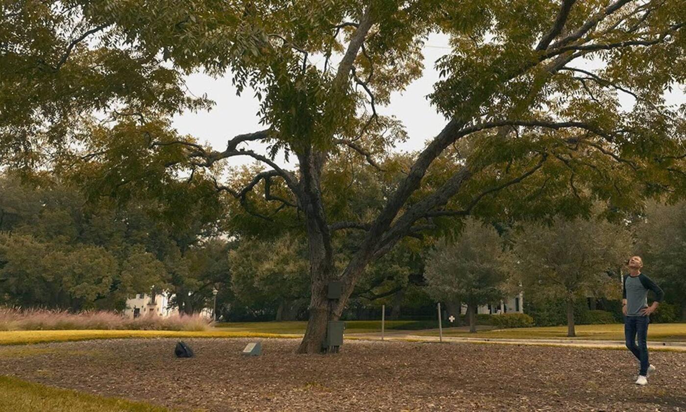Elliott Bambrough standing by Pecan Tree